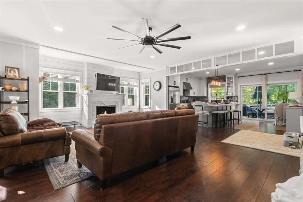 90 Walnut Road North Attleboro, MA 02760 - Photo 10 of 38 a living room with furniture wooden floor and a fireplace