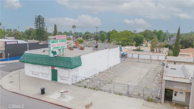 a terrace with outdoor seating and city view