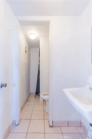 a view of a livingroom with furniture and window
