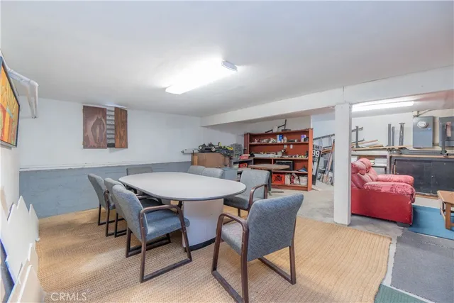 a kitchen with wooden cabinets and sink
