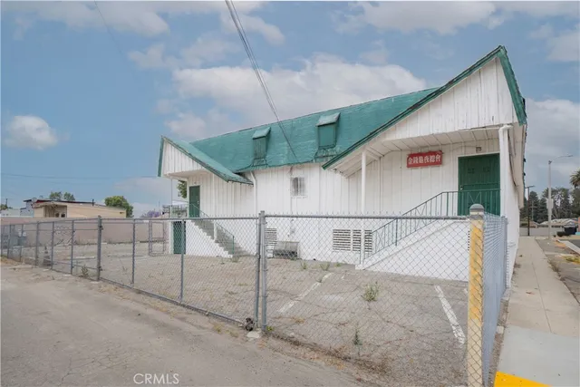 a kitchen with stainless steel appliances granite countertop a sink and a counter top space