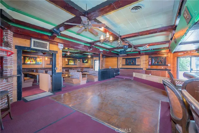 a view of a chairs and tables in patio