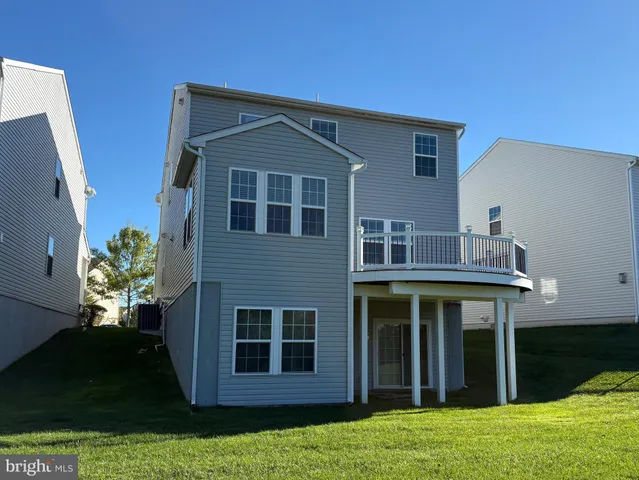 a bathroom with a tub and shower