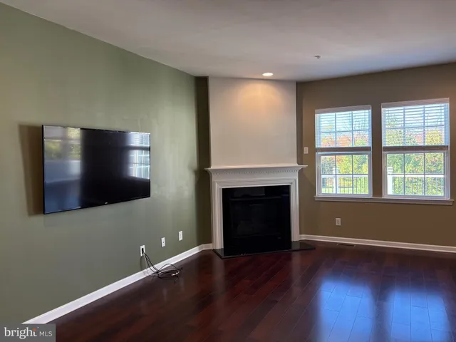 an outdoor space with lounge chairs