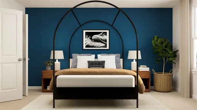 a bedroom with a bed and potted plant