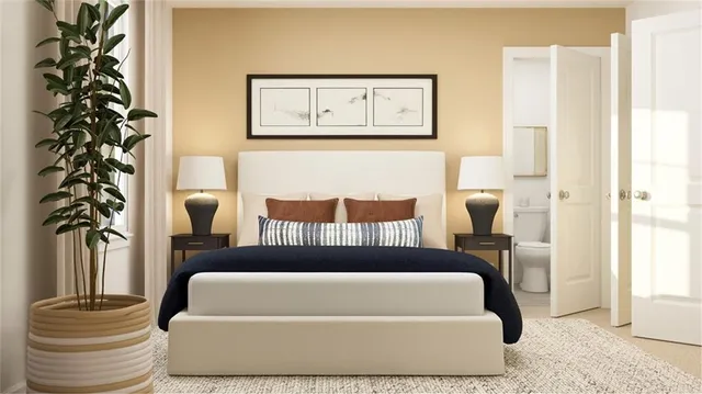 a bed sitting in a bedroom next to a window with outer view