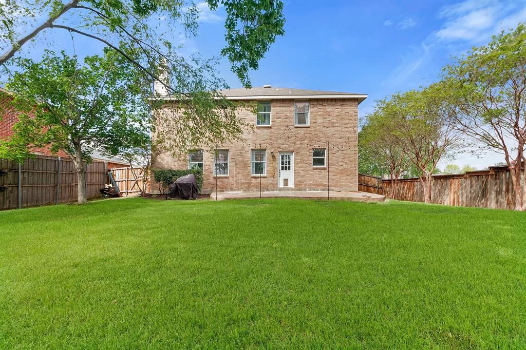 3601 McClintick Road McKinney, TX 75070 - Photo 24 of 24 a front view of house with yard and outdoor seating