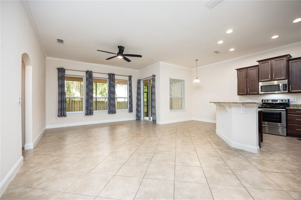 8216 Northwest 54th Street Gainesville, FL 32653 - Photo 20 of 57 a view of a kitchen with a sink and stainless steel appliances