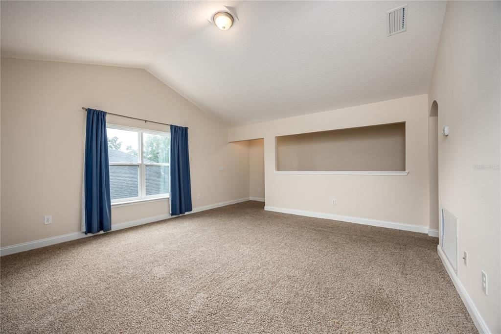 8216 Northwest 54th Street Gainesville, FL 32653 - Photo 42 of 57 an empty room with windows