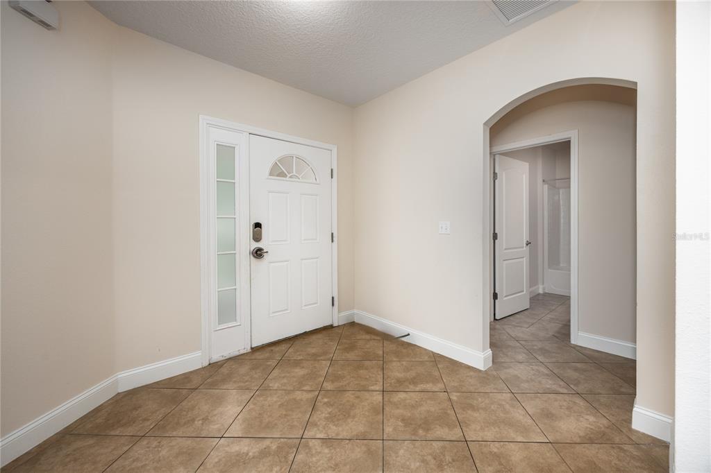 8216 Northwest 54th Street Gainesville, FL 32653 - Photo 10 of 57 a view of an empty room and window