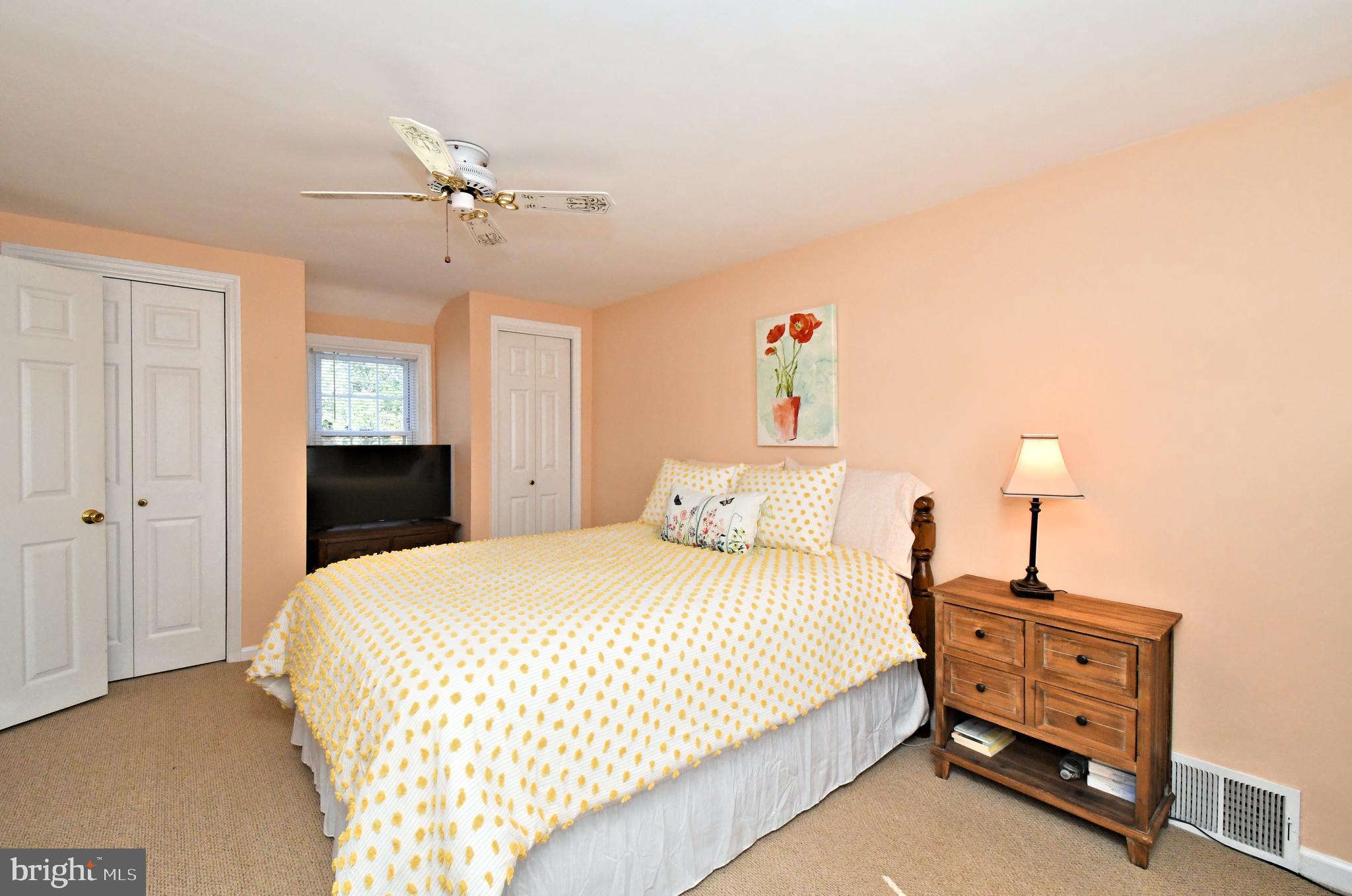 442 Oreland Mill Road Oreland, PA 19075 - Photo 38 of 68 a bedroom with a bed and a chandelier