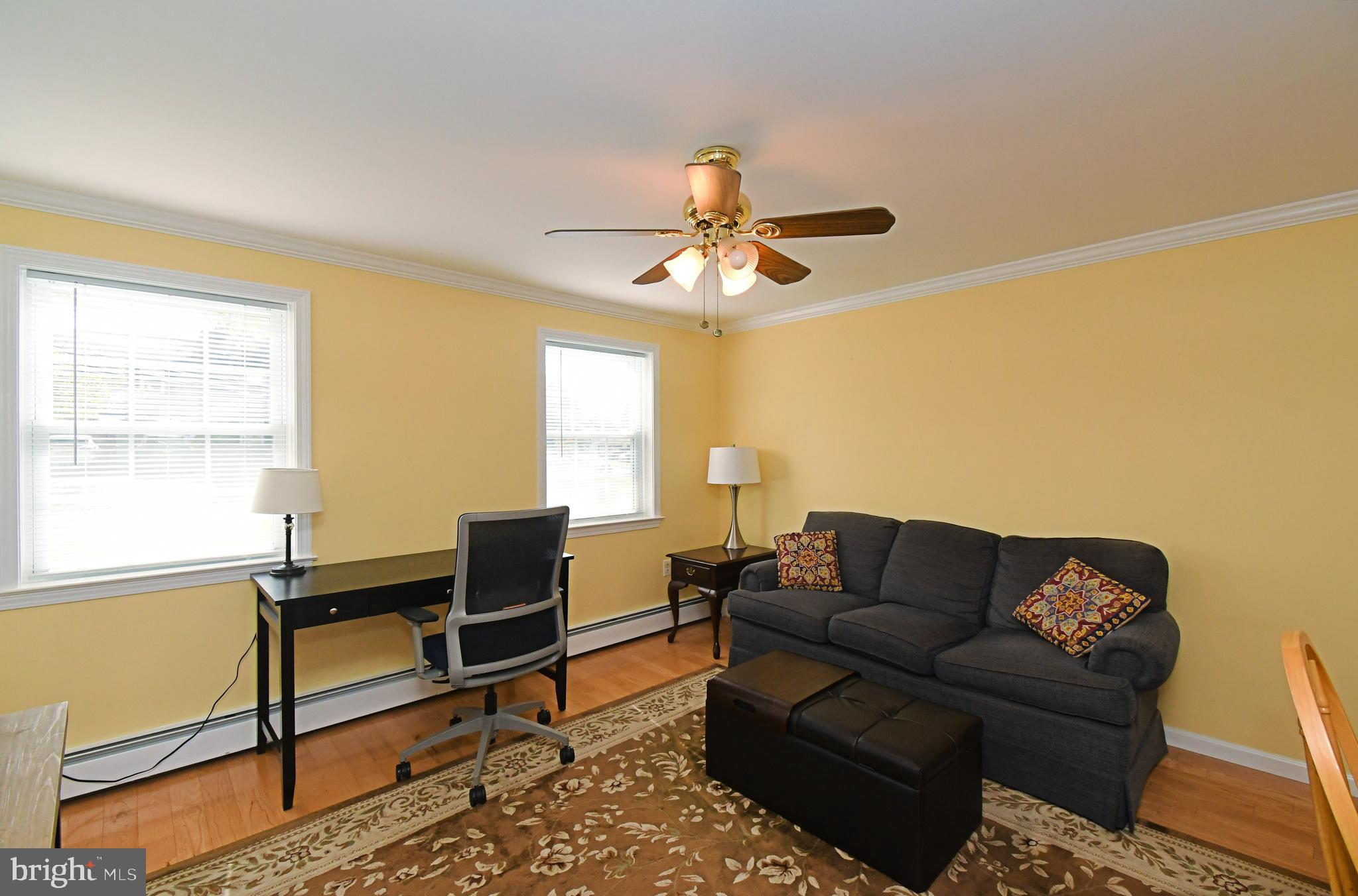 442 Oreland Mill Road Oreland, PA 19075 - Photo 46 of 68 a living room with furniture and a window