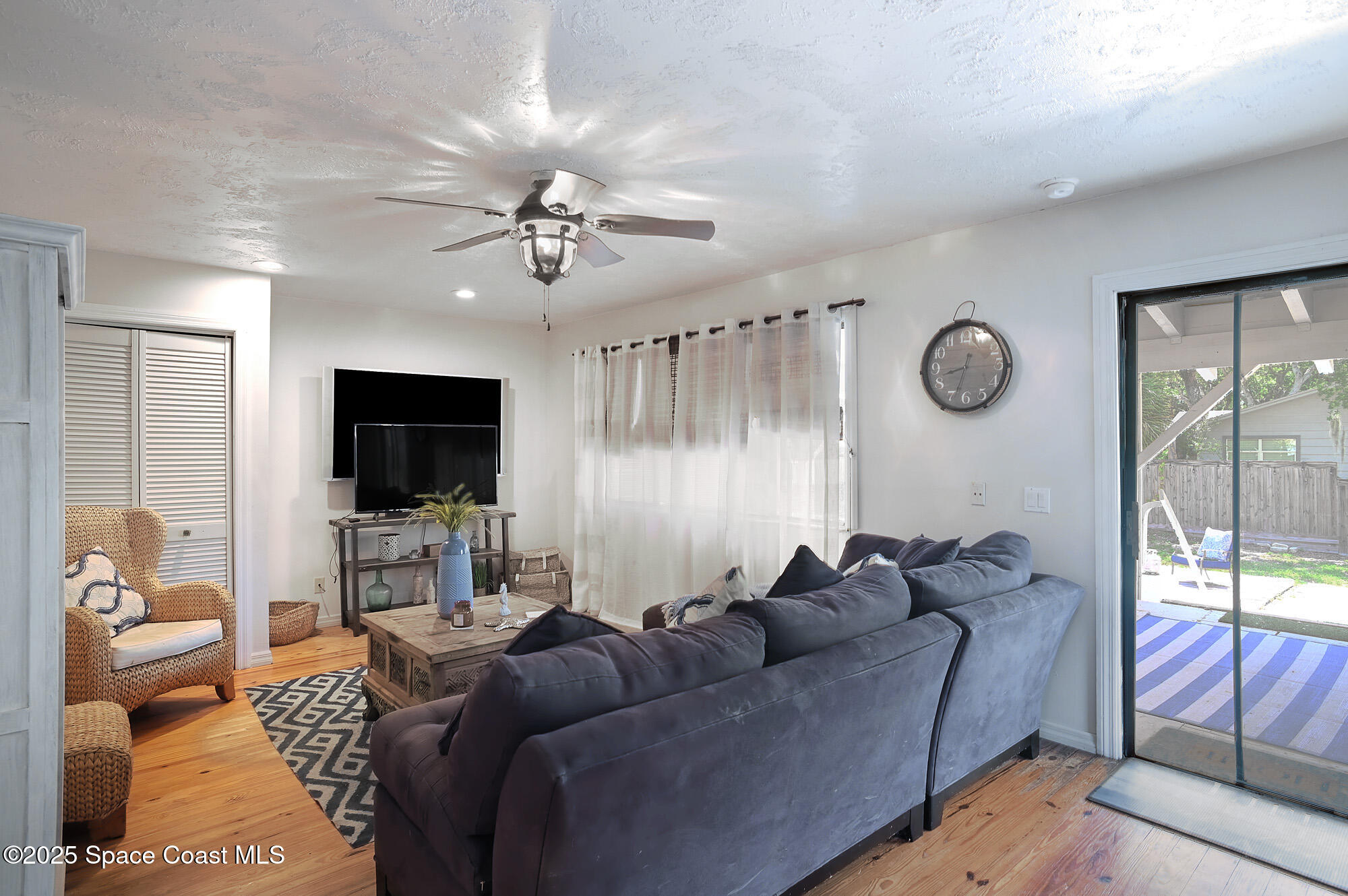 5875 Riverside Drive Melbourne Beach, FL 32951 - Photo 12 of 41 Family Room w/Slider