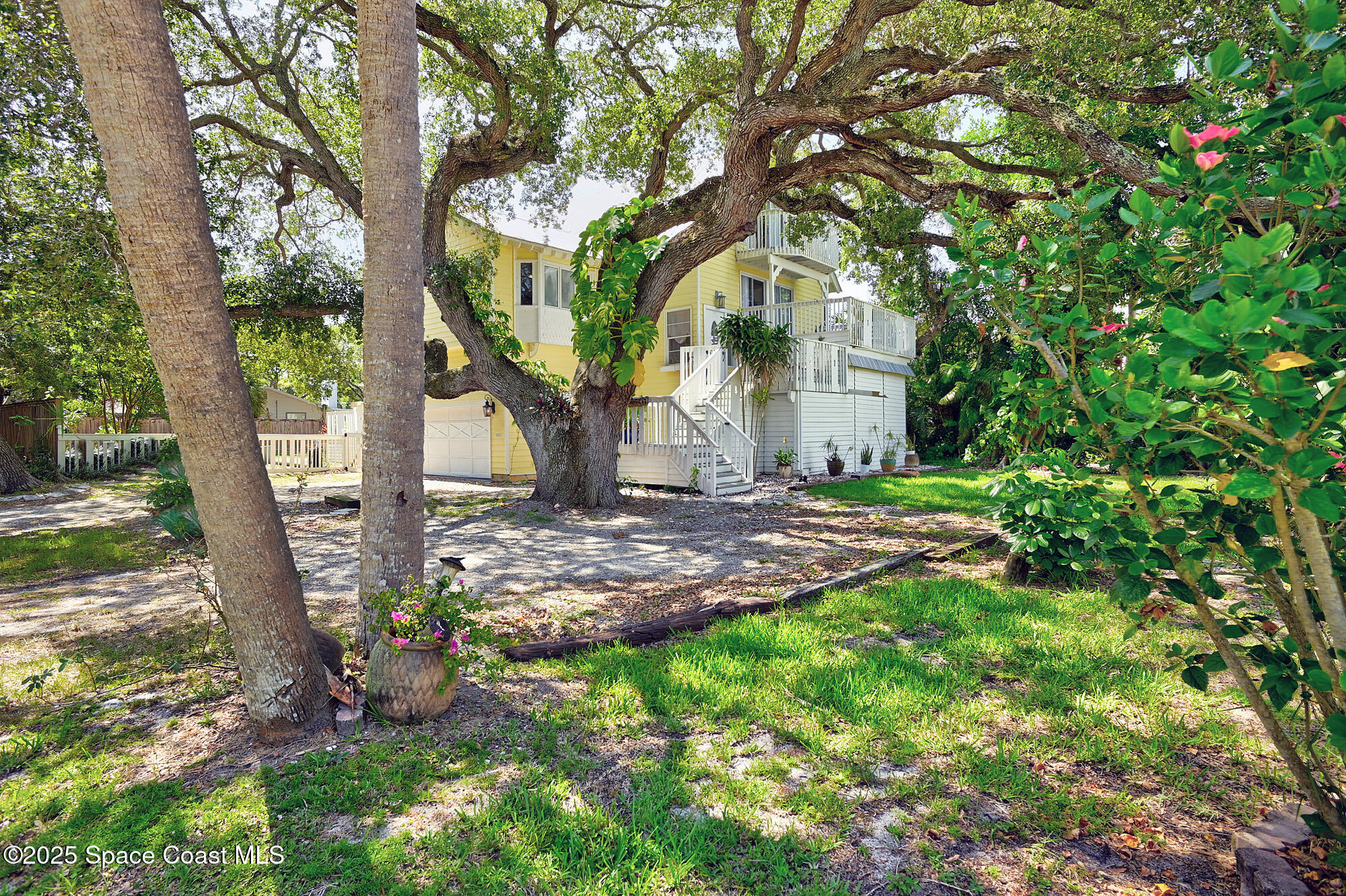 5875 Riverside Drive Melbourne Beach, FL 32951 - Photo 27 of 41 Nestled in between many oaks