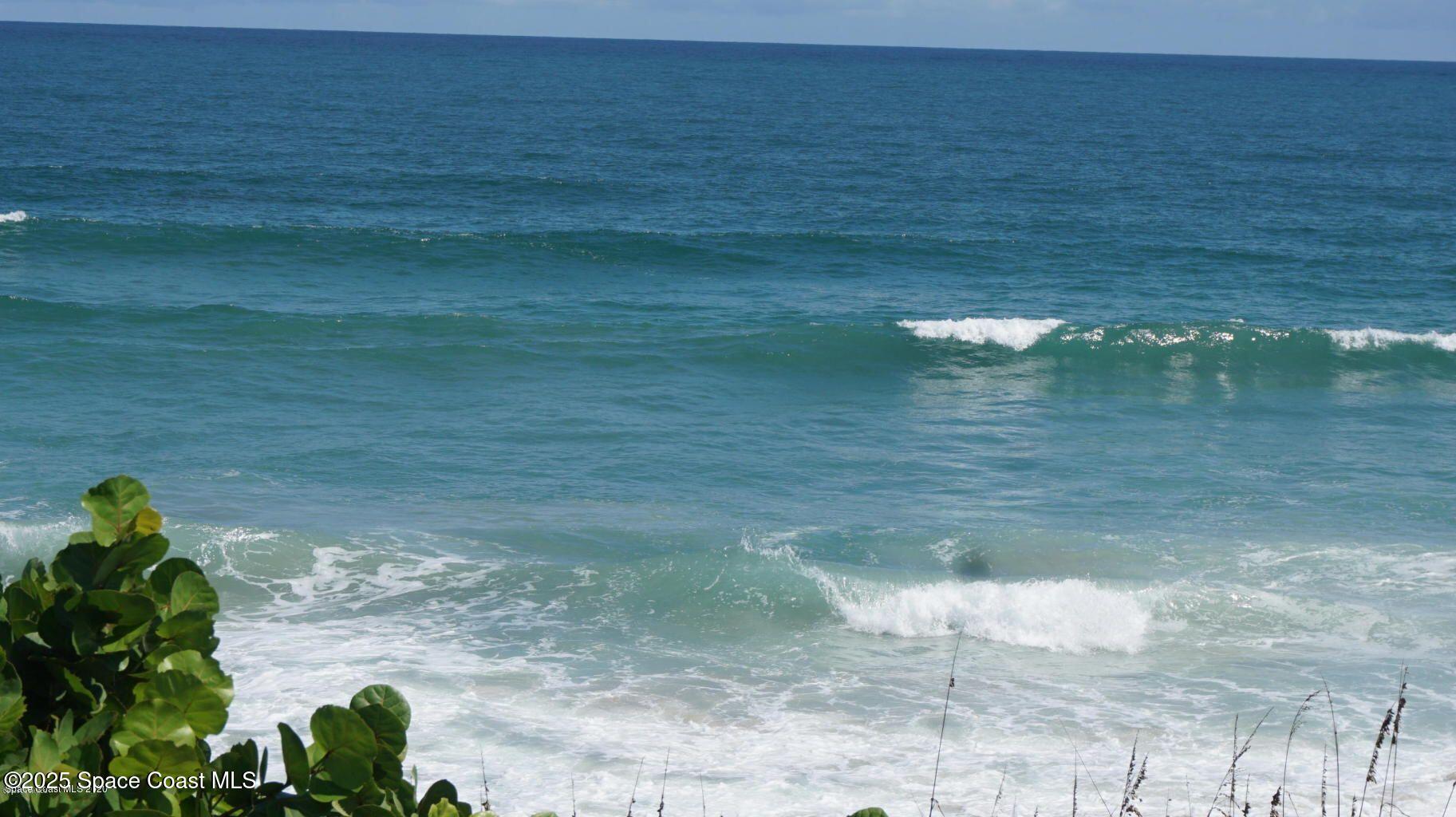 5875 Riverside Drive Melbourne Beach, FL 32951 - Photo 38 of 41 Nice waves rolling in on the sand