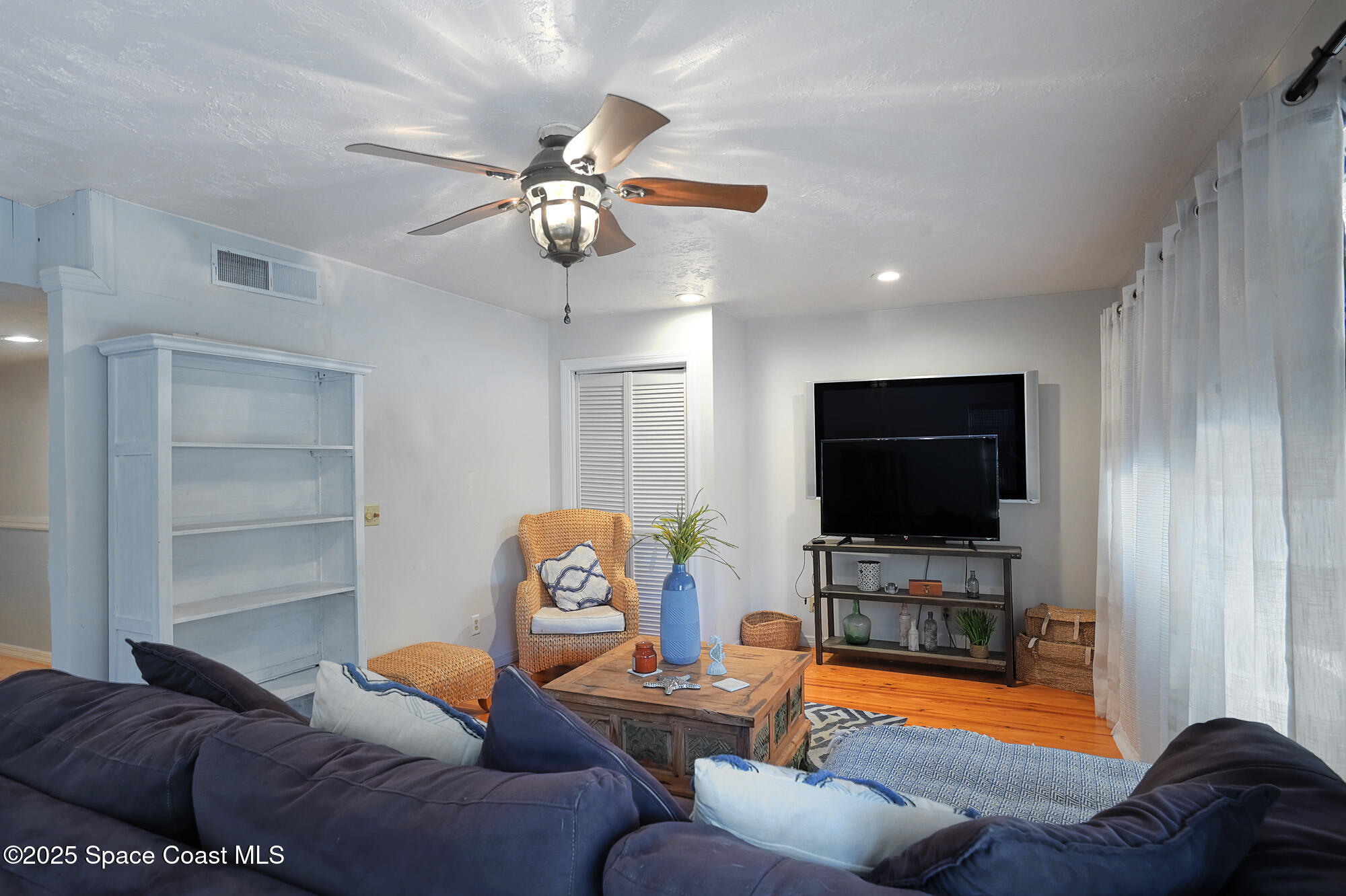 5875 Riverside Drive Melbourne Beach, FL 32951 - Photo 10 of 41 First floor family room