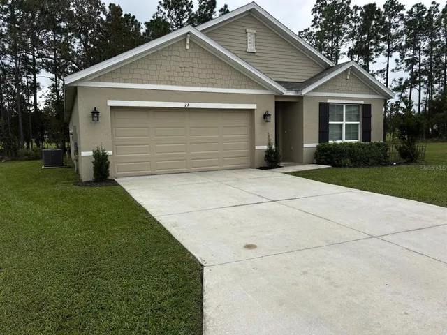 a view of outdoor space yard and garage