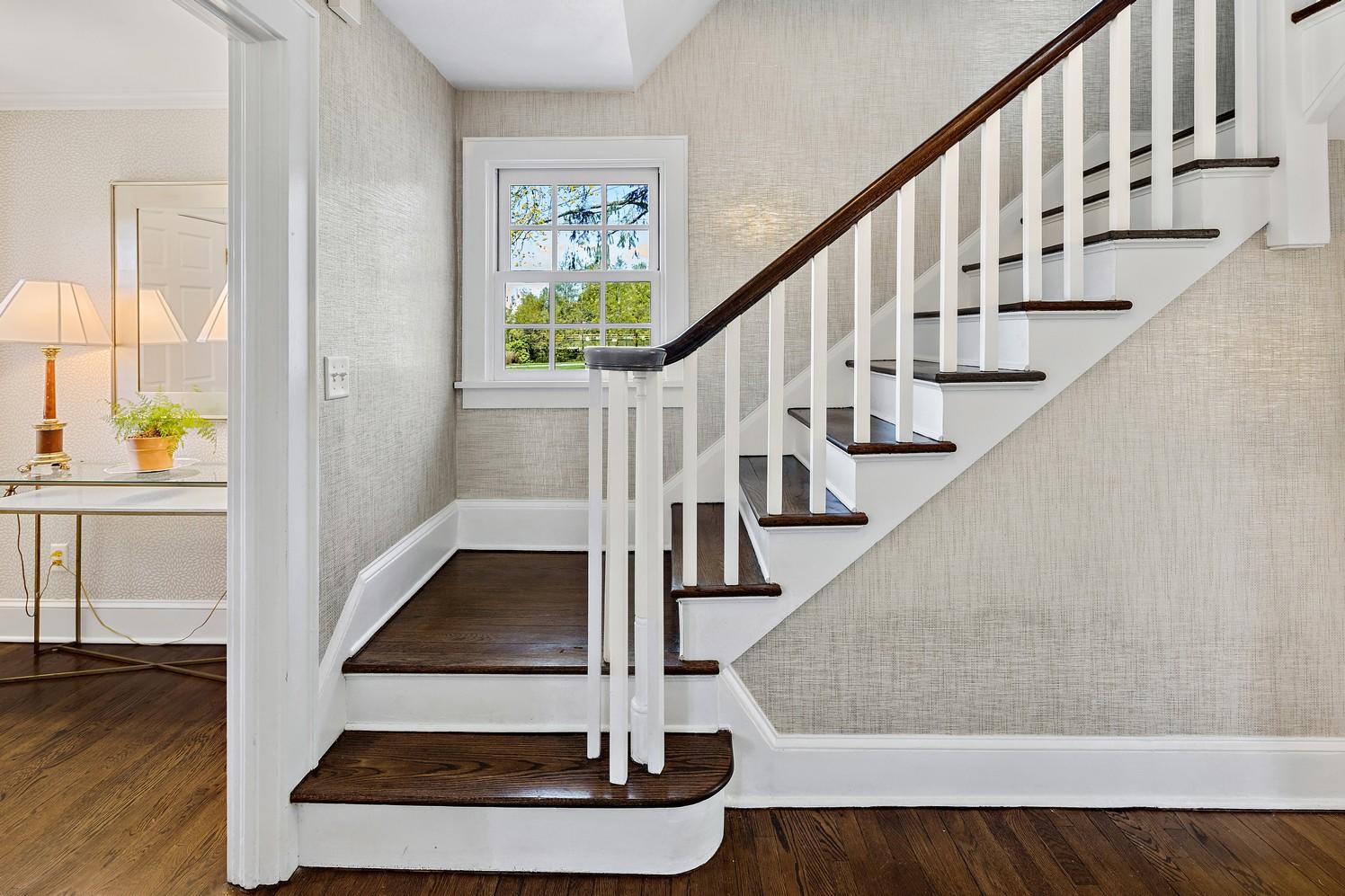 9 Beach Drive Darien, CT 06820 - Photo 11 of 39 a view of entryway and hall with wooden floor