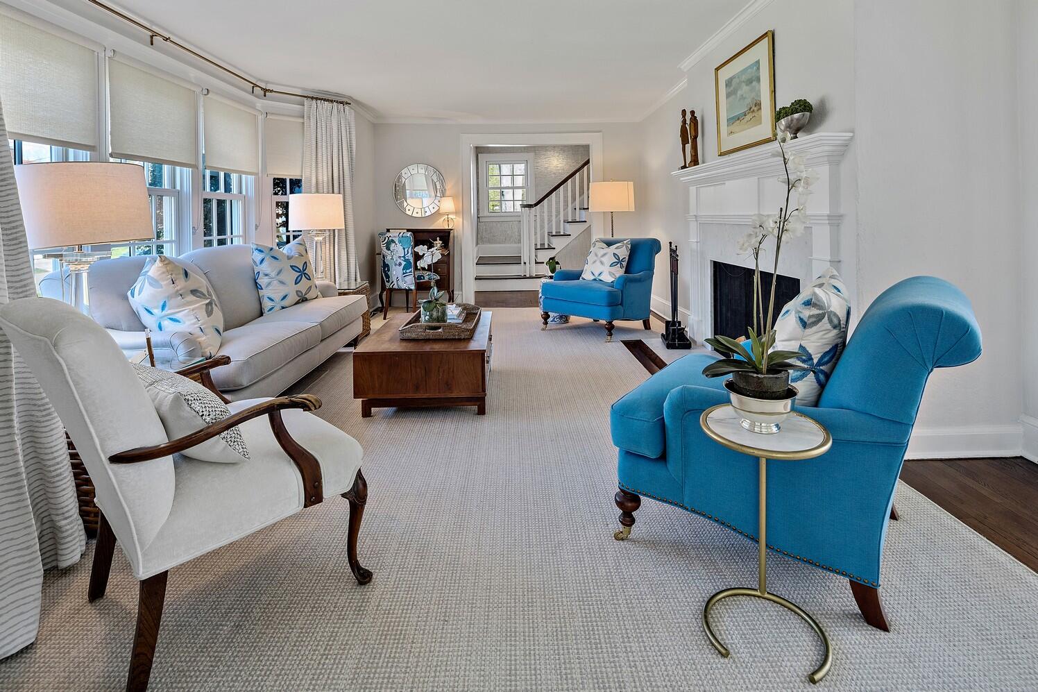 9 Beach Drive Darien, CT 06820 - Photo 13 of 39 a living room with furniture and a fireplace