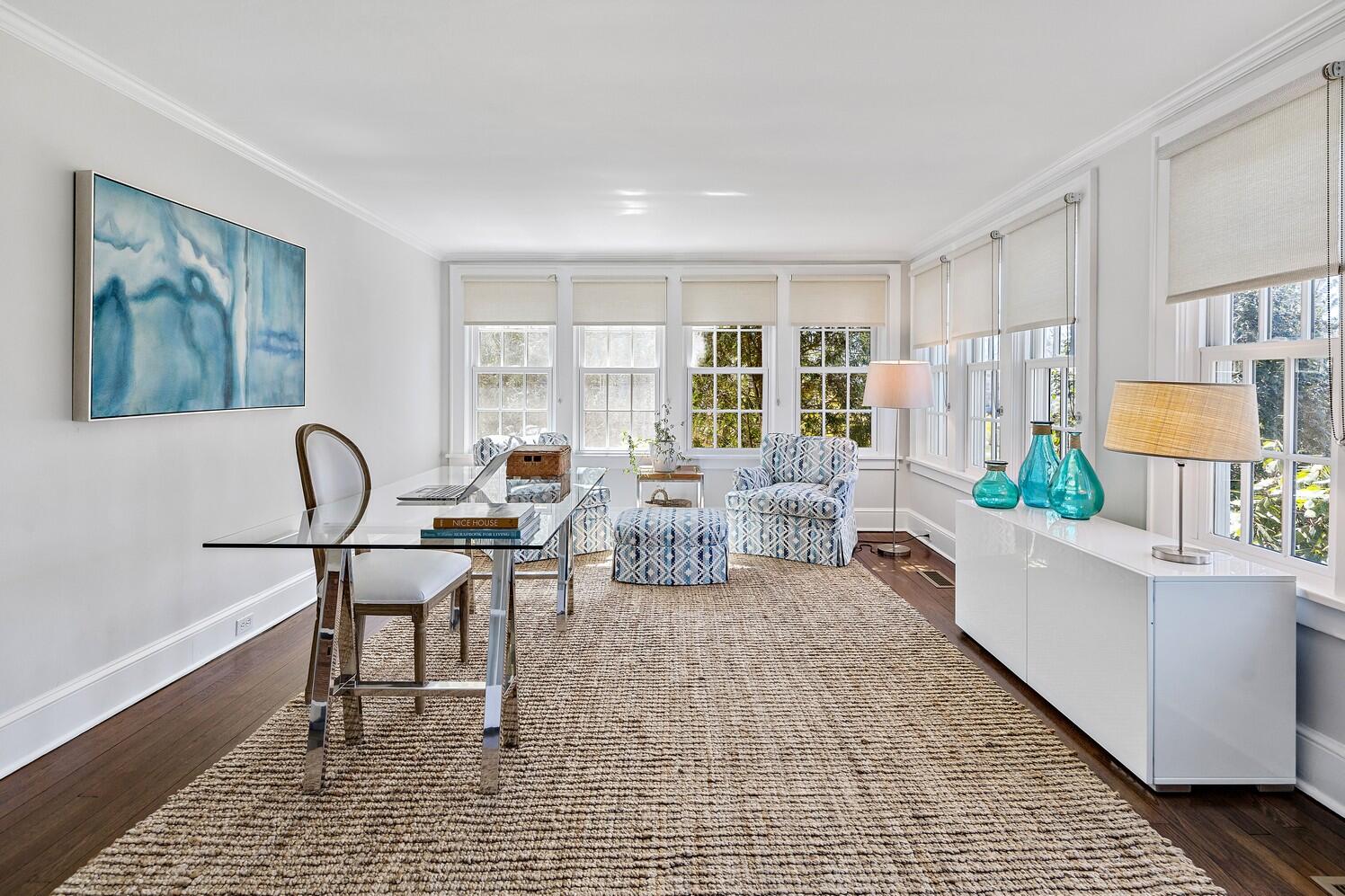 9 Beach Drive Darien, CT 06820 - Photo 15 of 39 a living room with furniture and a table