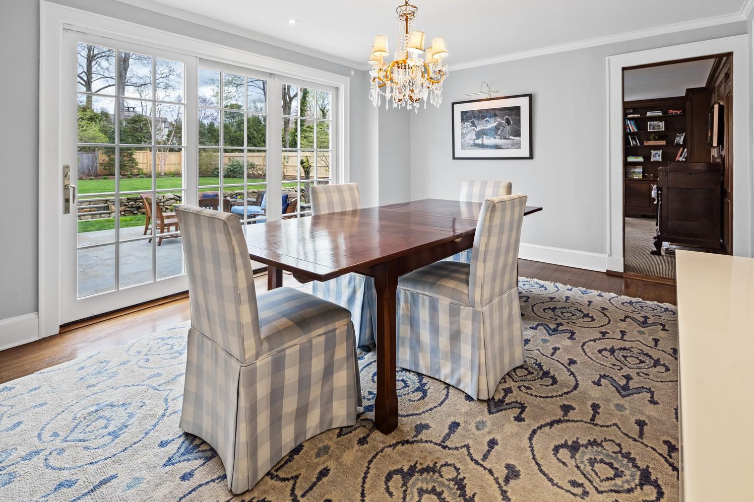 9 Beach Drive Darien, CT 06820 - Photo 21 of 39 a view of a dining room with furniture window and wooden floor