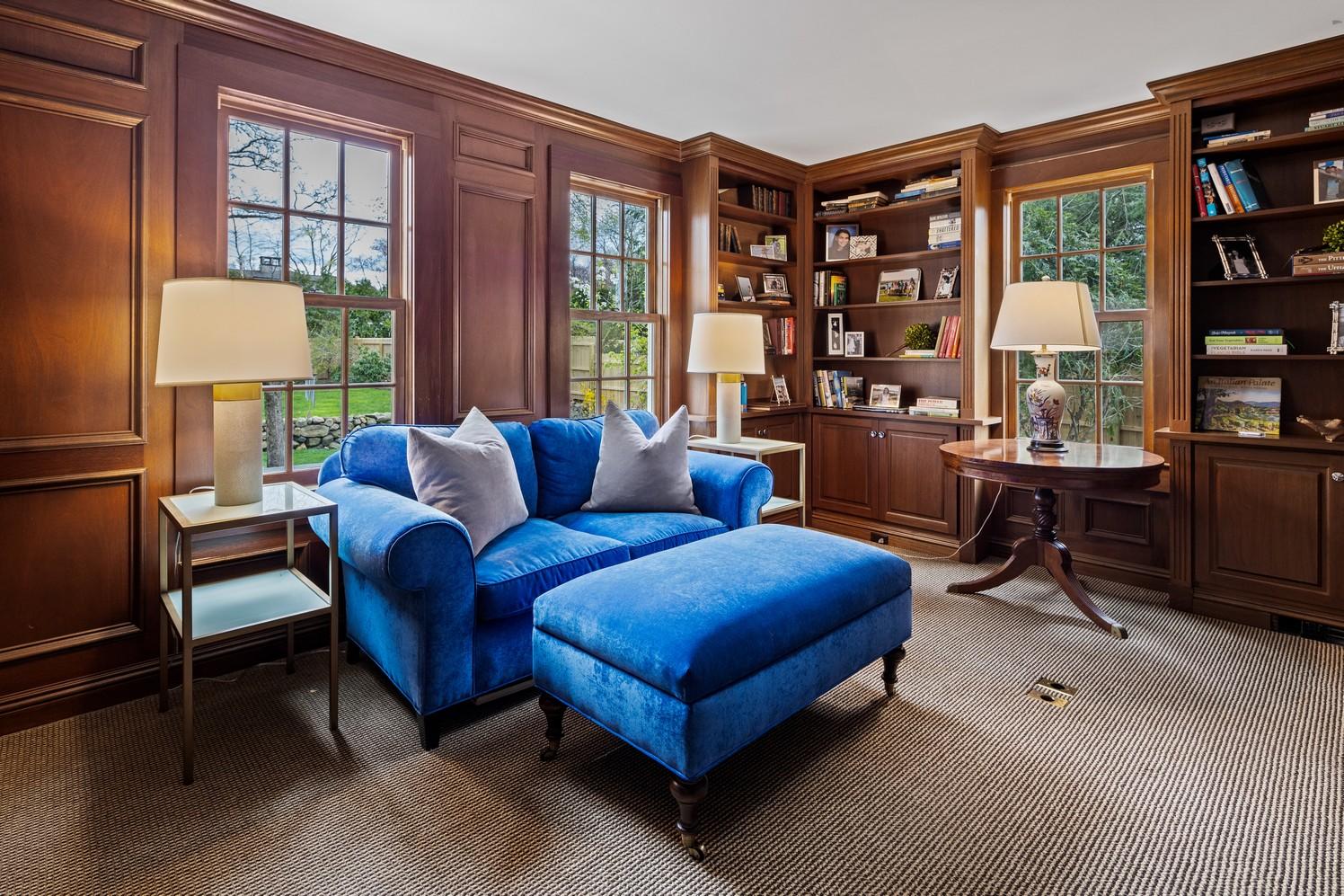9 Beach Drive Darien, CT 06820 - Photo 24 of 39 a living room with furniture and a large window