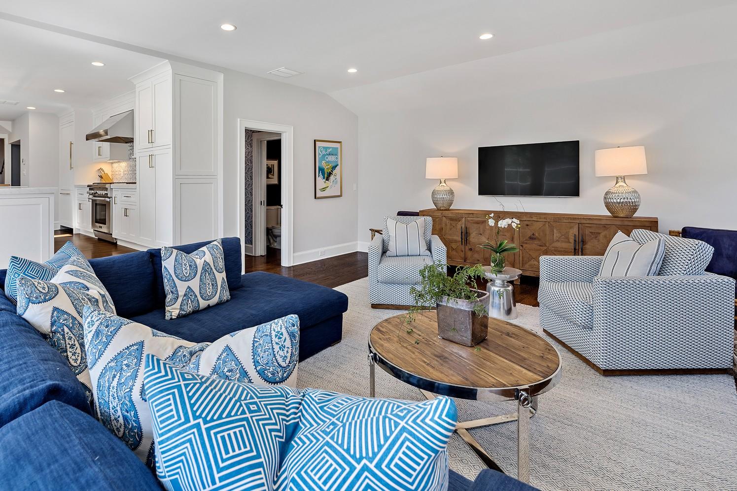 9 Beach Drive Darien, CT 06820 - Photo 27 of 39 a living room with furniture and a flat screen tv