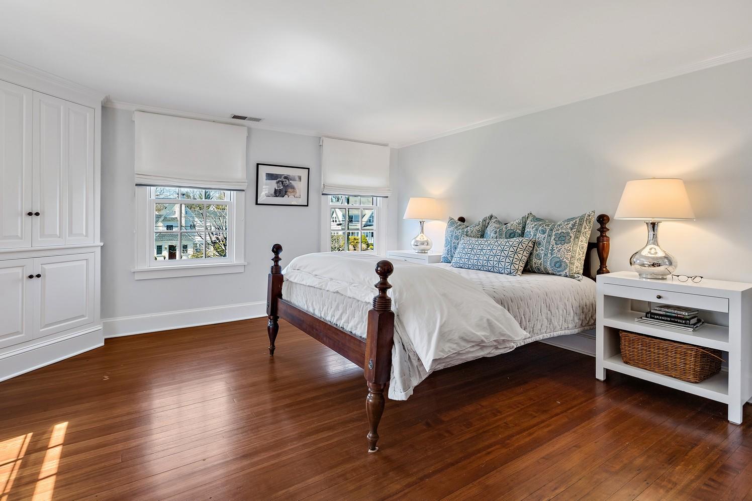 9 Beach Drive Darien, CT 06820 - Photo 29 of 39 a bedroom with a bed and a window