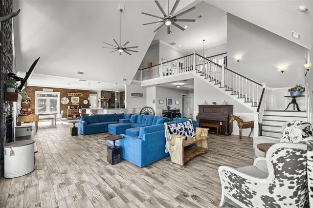 a room with furniture and a wooden floor