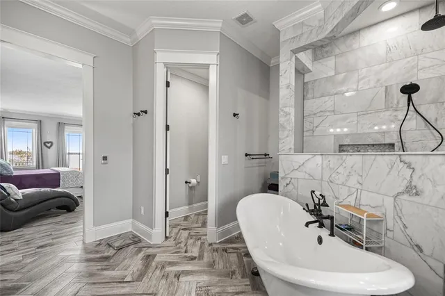 a bathroom with a sink a mirror and a shower