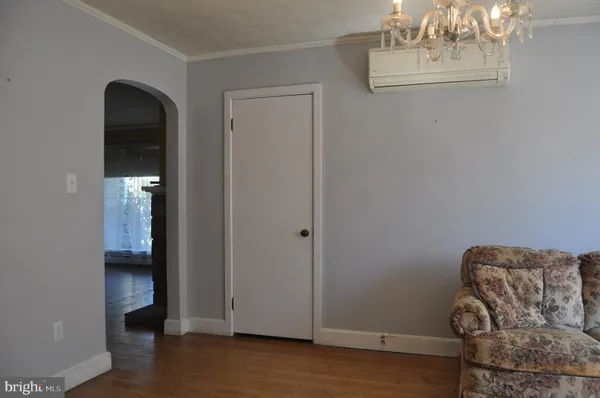 a view of livingroom with furniture and wooden floor