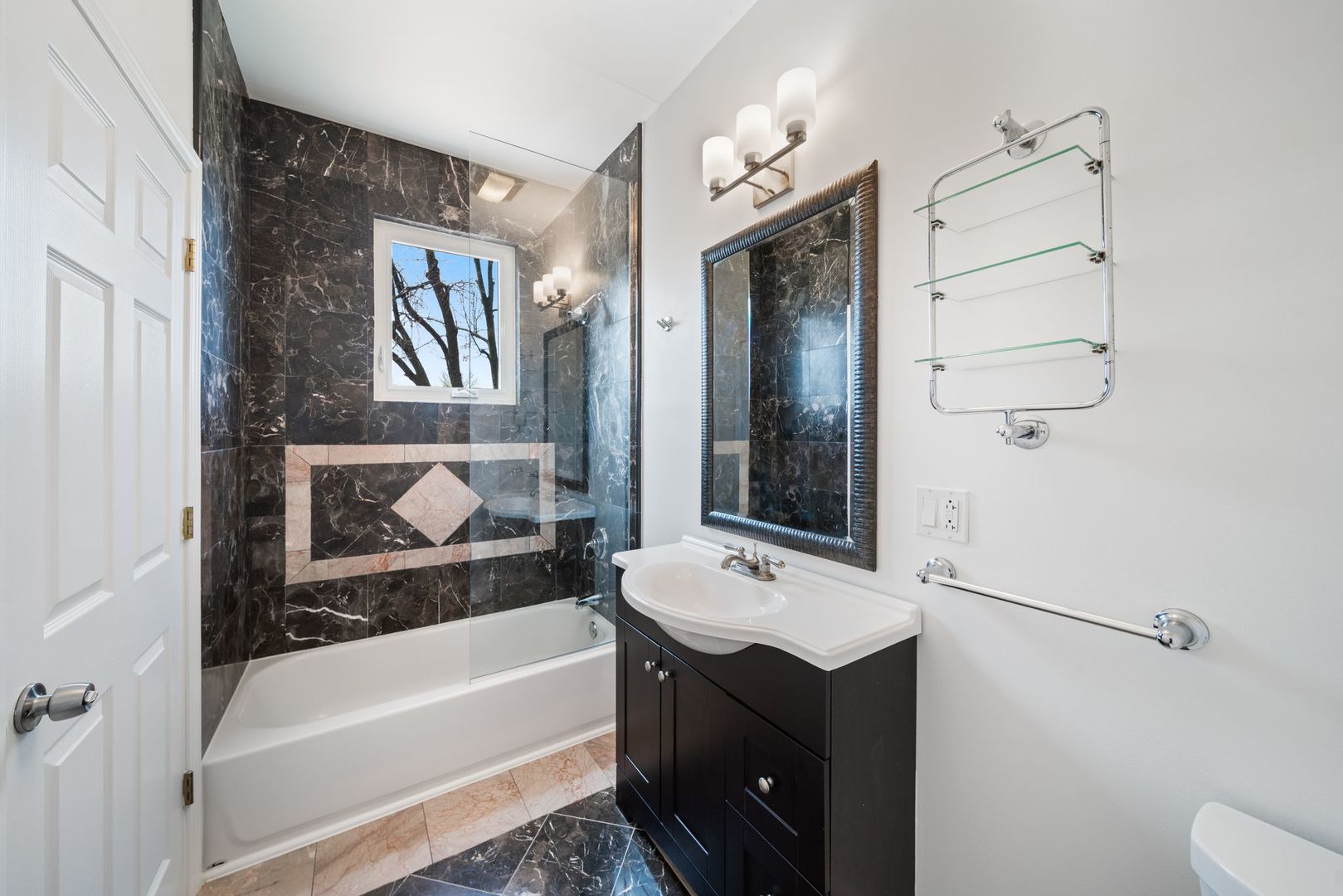 701 Oakton Street Park Ridge, IL 60068 - Photo 30 of 59 a bathroom with a tub a sink and a large mirror