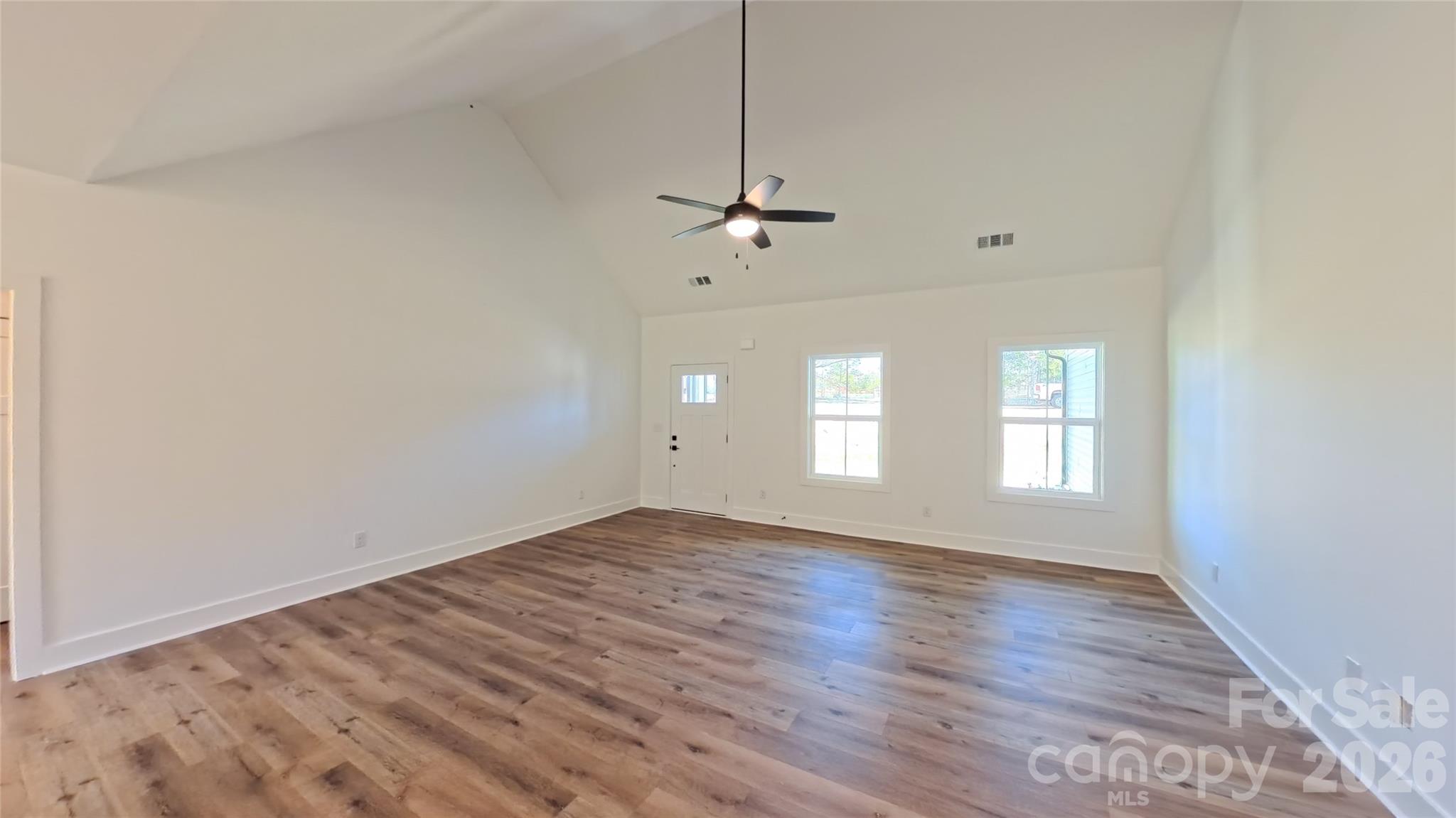 4018 Deerstone Lane, Unit 24 Clover, SC 29710 - Photo 20 of 48 a view of empty room with wooden floor and fan