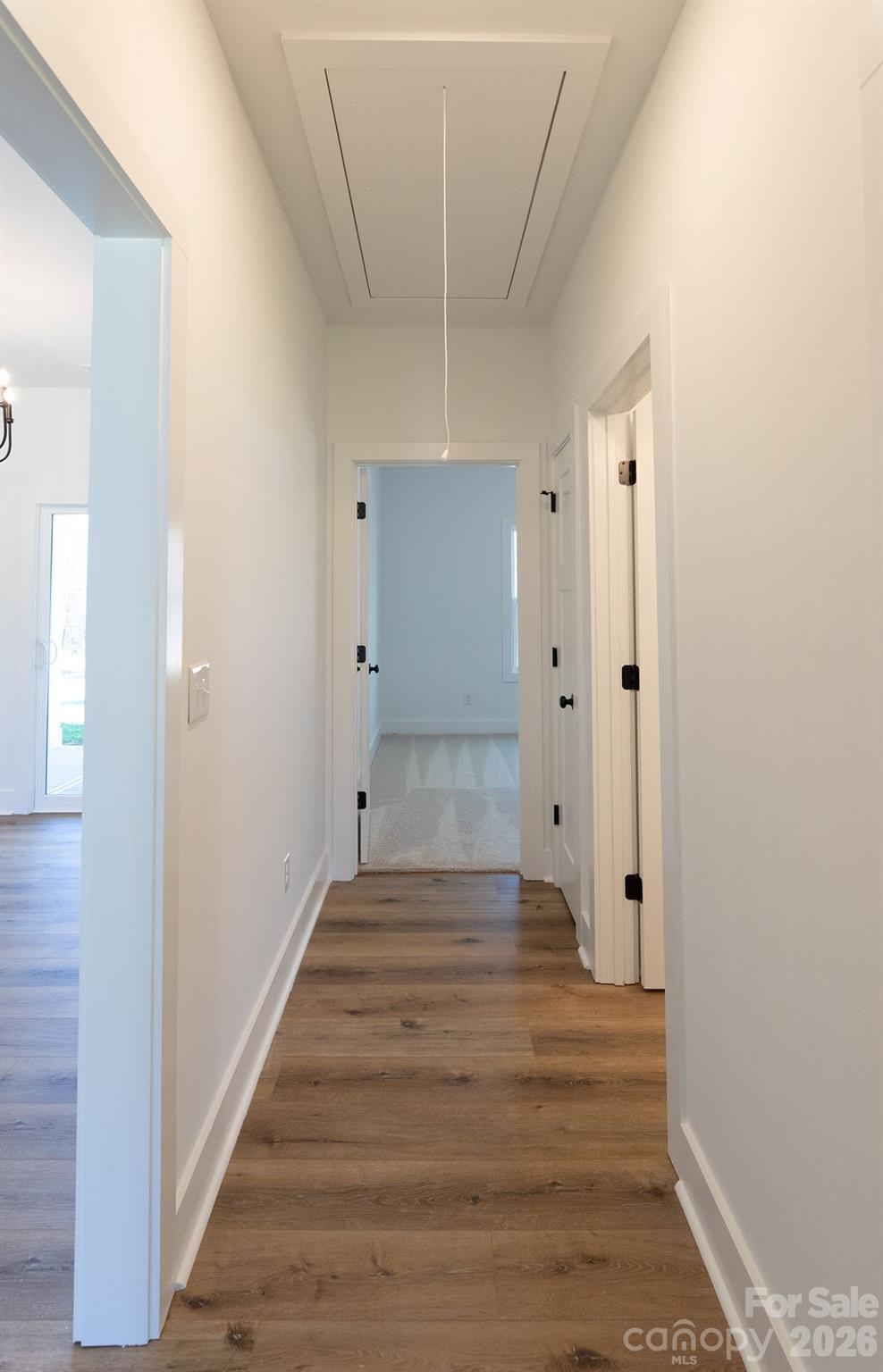 4018 Deerstone Lane, Unit 24 Clover, SC 29710 - Photo 28 of 48 a view of a hallway with wooden floor and staircase