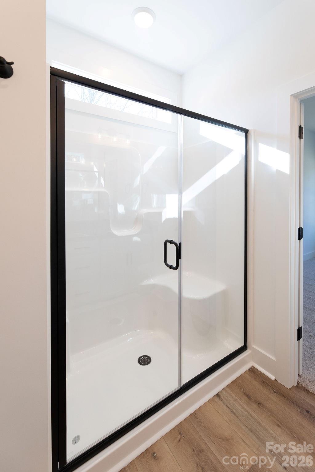 4018 Deerstone Lane, Unit 24 Clover, SC 29710 - Photo 34 of 48 a bathroom with a glass shower door