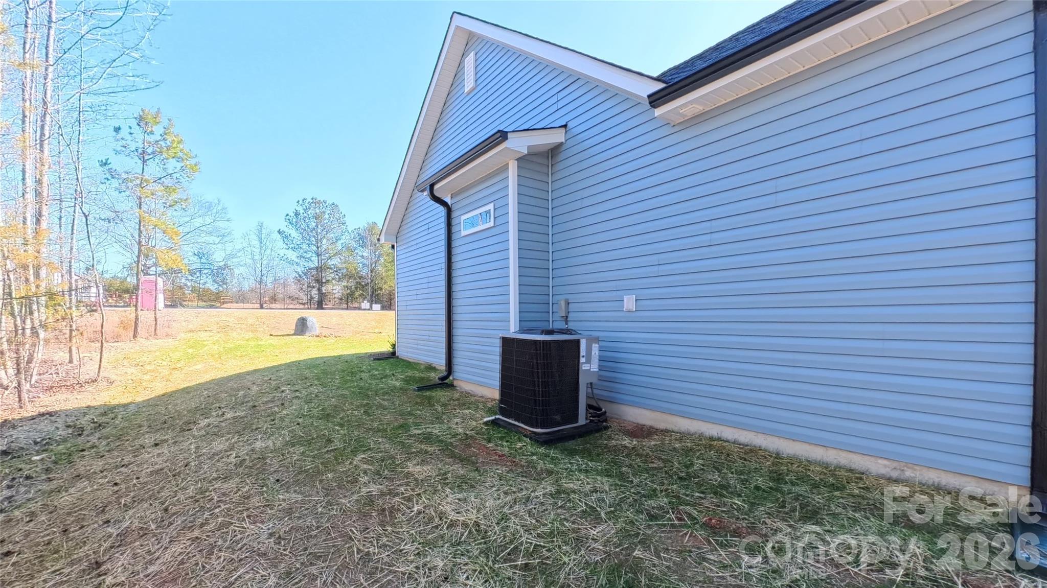 4018 Deerstone Lane, Unit 24 Clover, SC 29710 - Photo 4 of 48 a view of a backyard with a garden