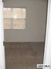 8312 Rudolph Road, Unit 8312 Charlotte, NC 28216 - Photo 5 of 8 a view of a small space with window