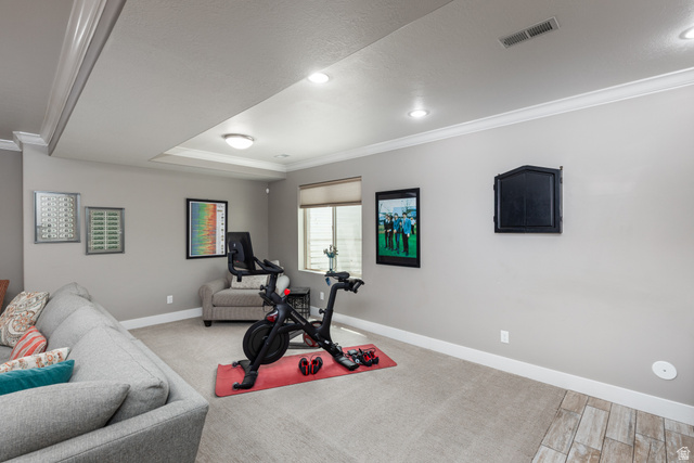 1132 Sunset Dunes Way Draper, UT 84020 - Photo 23 of 35 Carpeted room featuring a drop ceiling with recessed lighting, crown molding, and a light-colored window blind