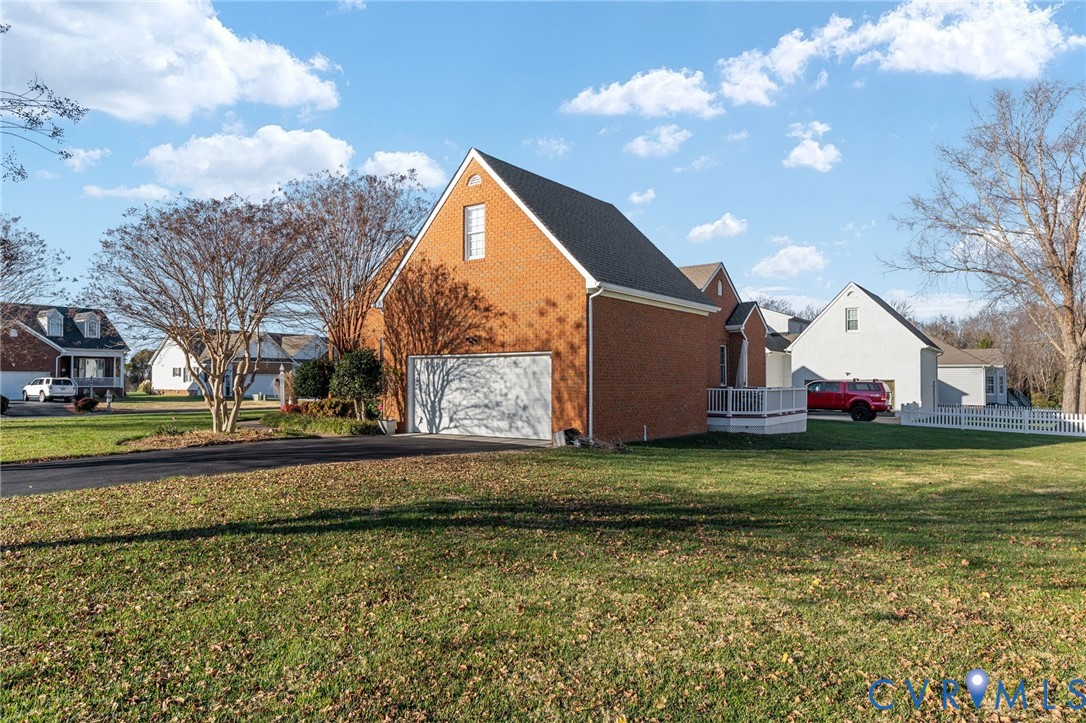 300 Lighthouse Pointe Hopewell, VA 23860 - Photo 18 of 19 a view of a house with a yard