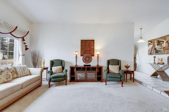 a living room with furniture and a couch