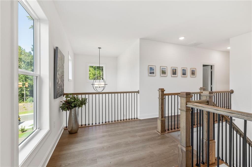 719 Crest Line Trail Powder Springs, GA 30127 - Photo 15 of 29 a view of a hallway with windows and entryway