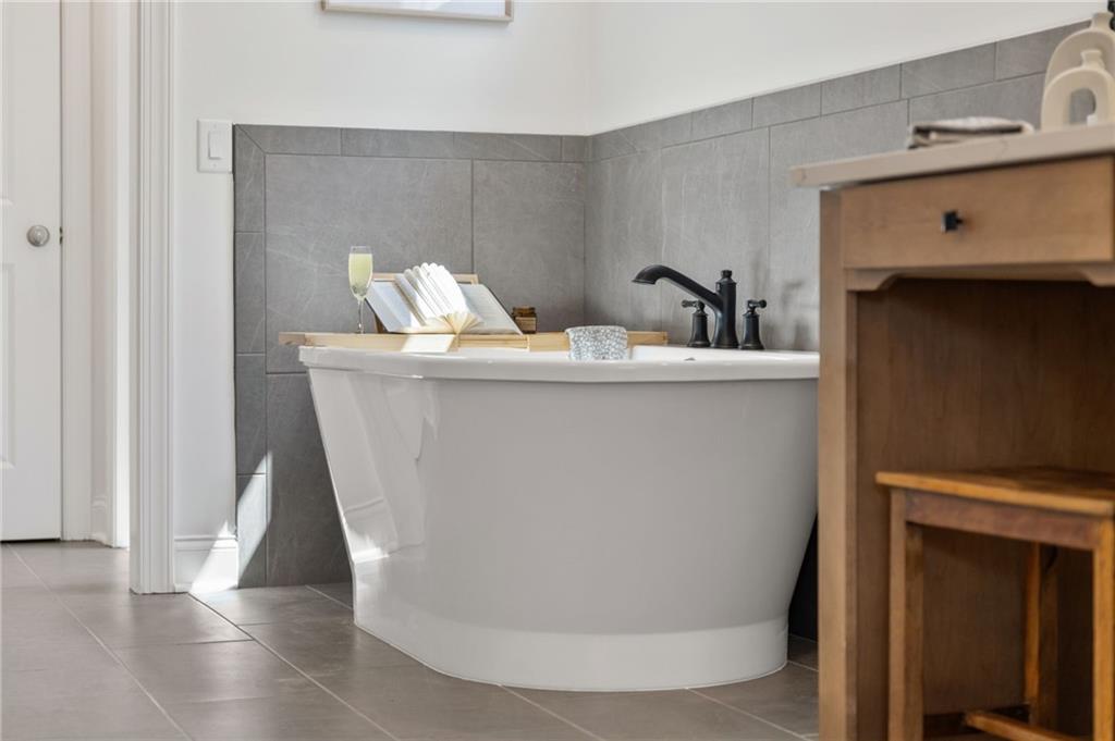719 Crest Line Trail Powder Springs, GA 30127 - Photo 19 of 29 a view of living room with furniture and wooden floor