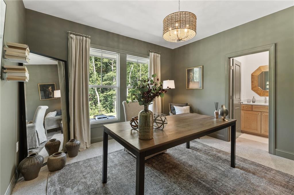 719 Crest Line Trail Powder Springs, GA 30127 - Photo 21 of 29 a view of a livingroom with furniture and window
