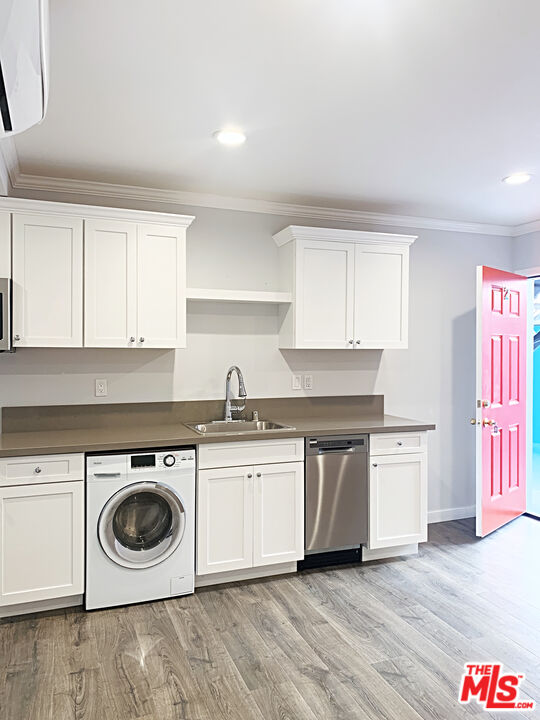 908 North Louise Street, Unit 2 Glendale, CA 91207 - Photo 4 of 15 a kitchen with stainless steel appliances sink a stove and cabinets
