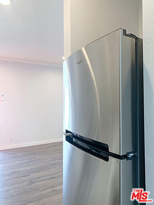 908 North Louise Street, Unit 2 Glendale, CA 91207 - Photo 7 of 15 an empty room with wooden floor