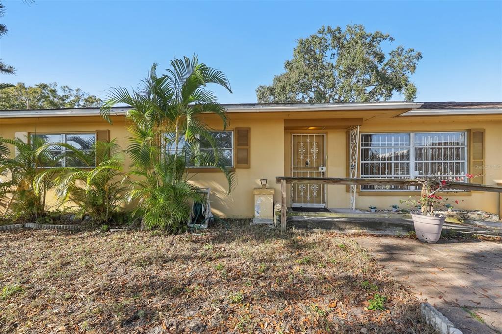 a house view with a garden space