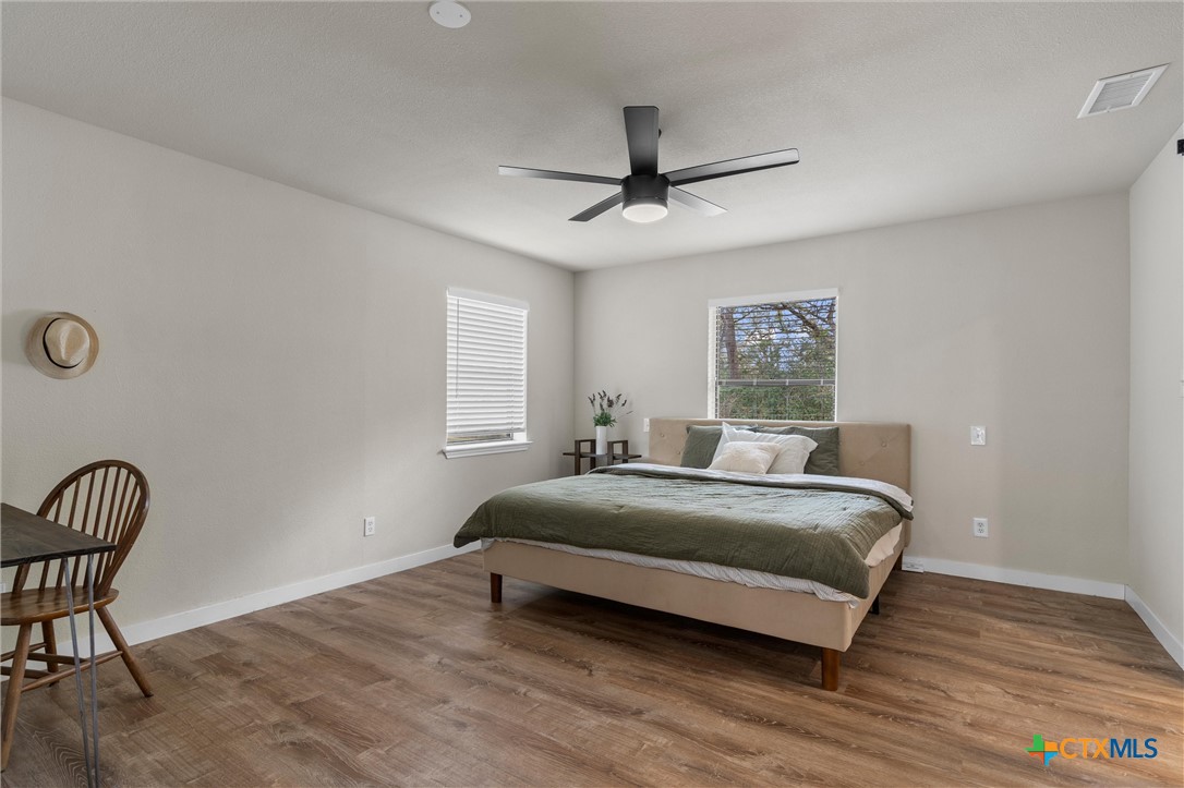 836 Cottle Town Road Smithville, TX 78957 - Photo 23 of 47 a bedroom with a bed chair and window
