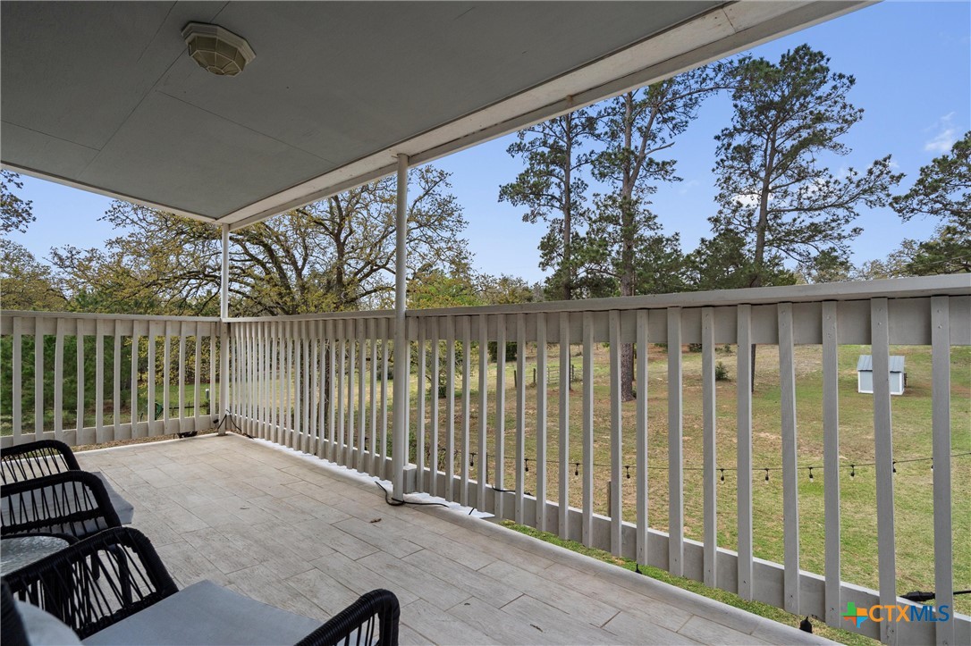 836 Cottle Town Road Smithville, TX 78957 - Photo 33 of 47 a view of a balcony
