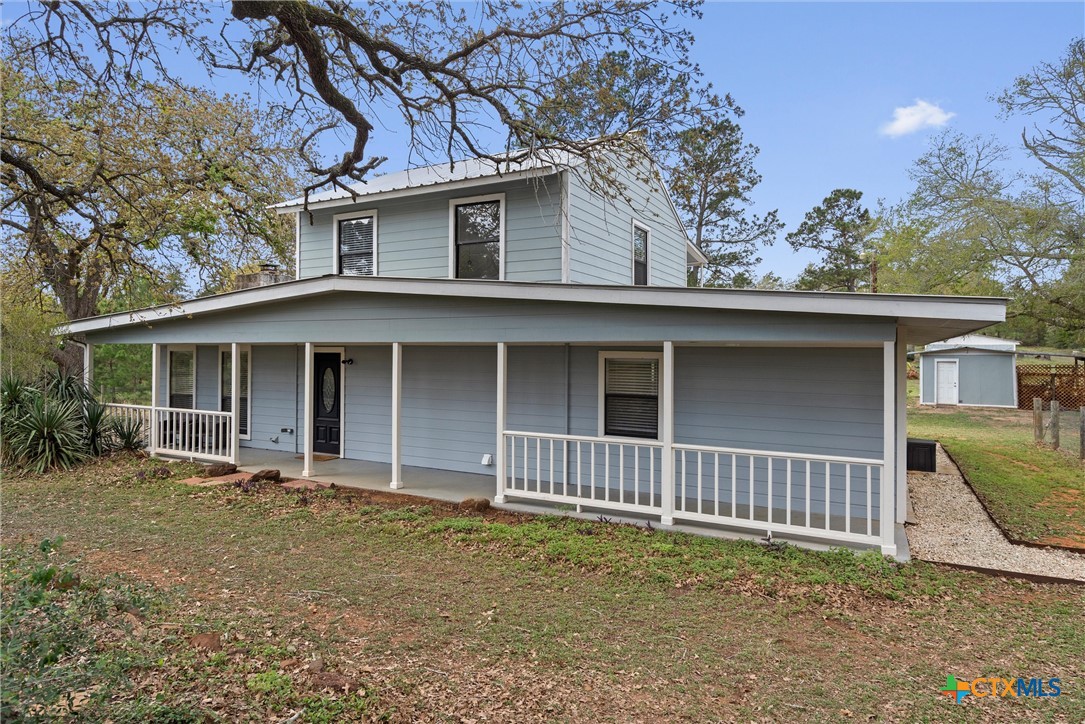 836 Cottle Town Road Smithville, TX 78957 - Photo 5 of 47 front view of a house with a yard