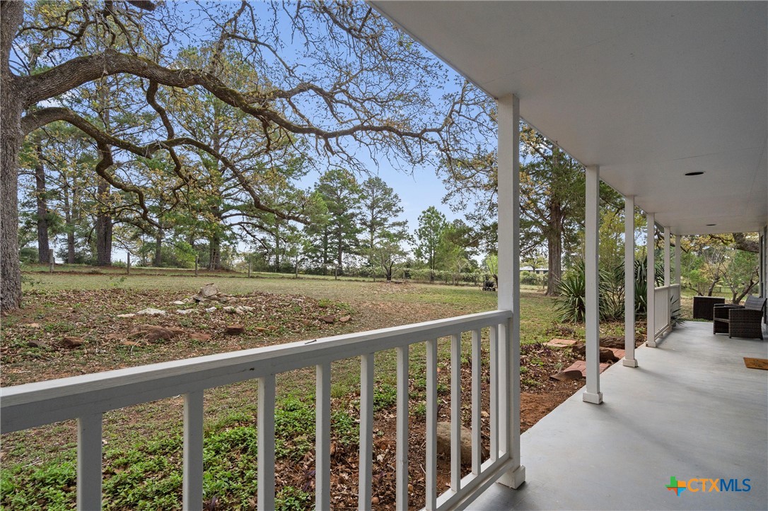 836 Cottle Town Road Smithville, TX 78957 - Photo 8 of 47 a view of balcony with furniture